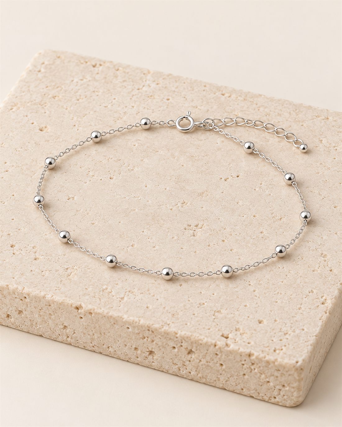 Pulsera de plata con once bolitas, largo 18 + 3 cm